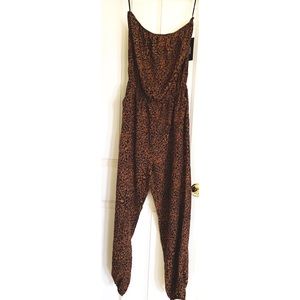 Lulu’s all over leopard print jumpsuit sz M